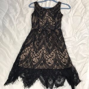 Nude and black lace dress